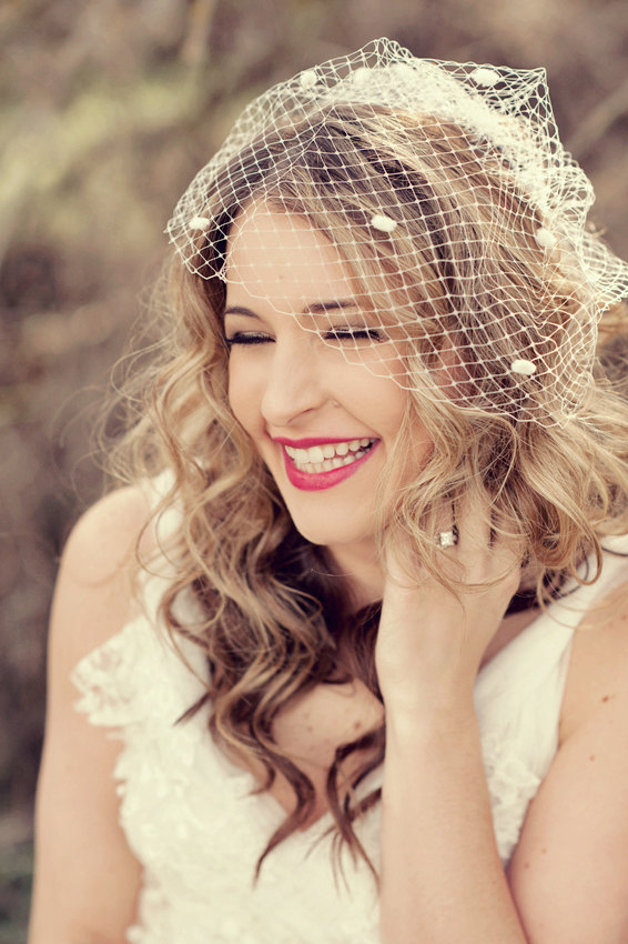 wedding hairstyle with birdcage veil