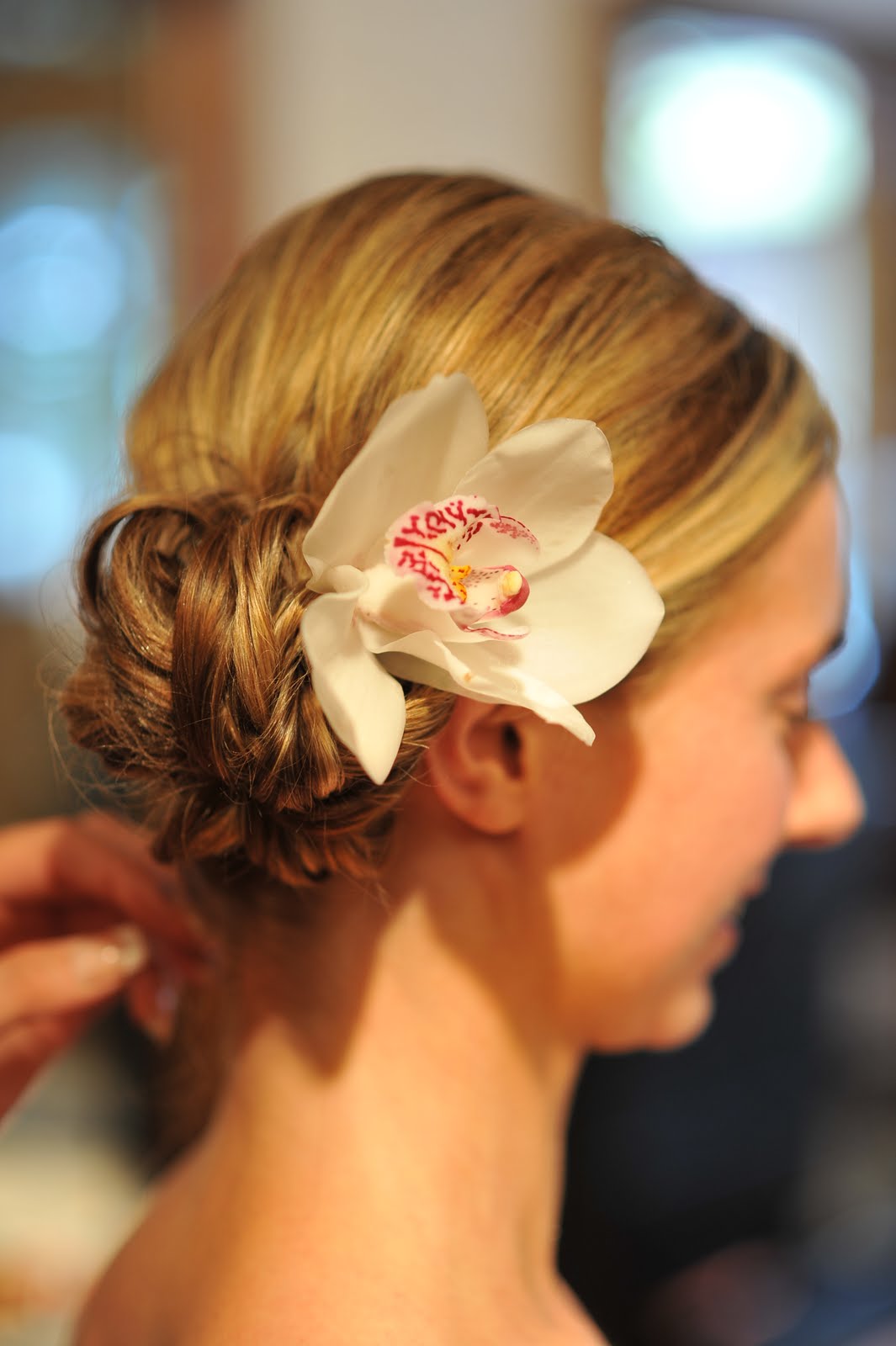 wedding hairstyles side bun with flower