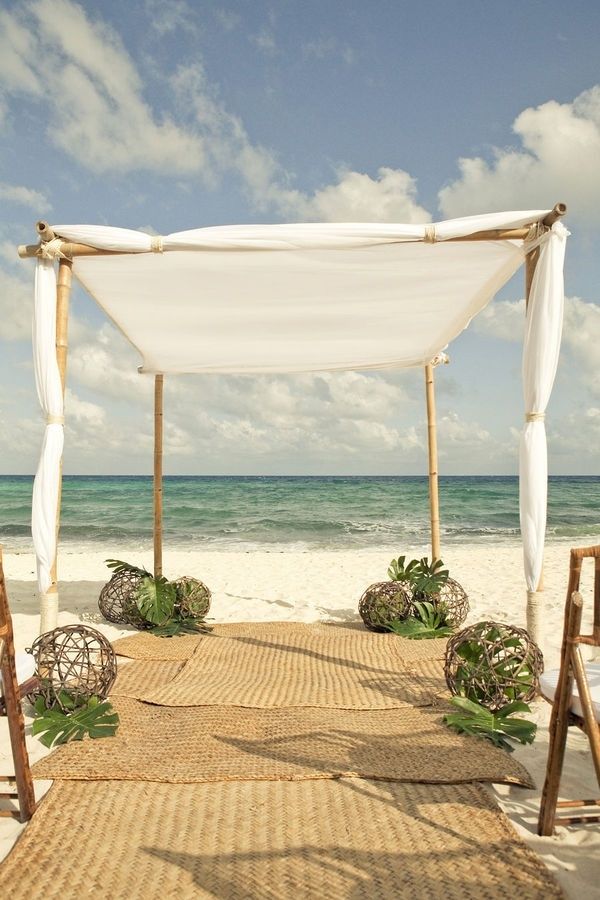 Grass mats make a great beach wedding aisle runner