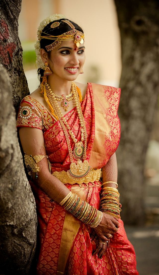 Indian bride wearing bridal saree and jewelry