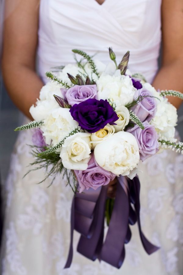 purple and lavender bouquet with cascading ribbon