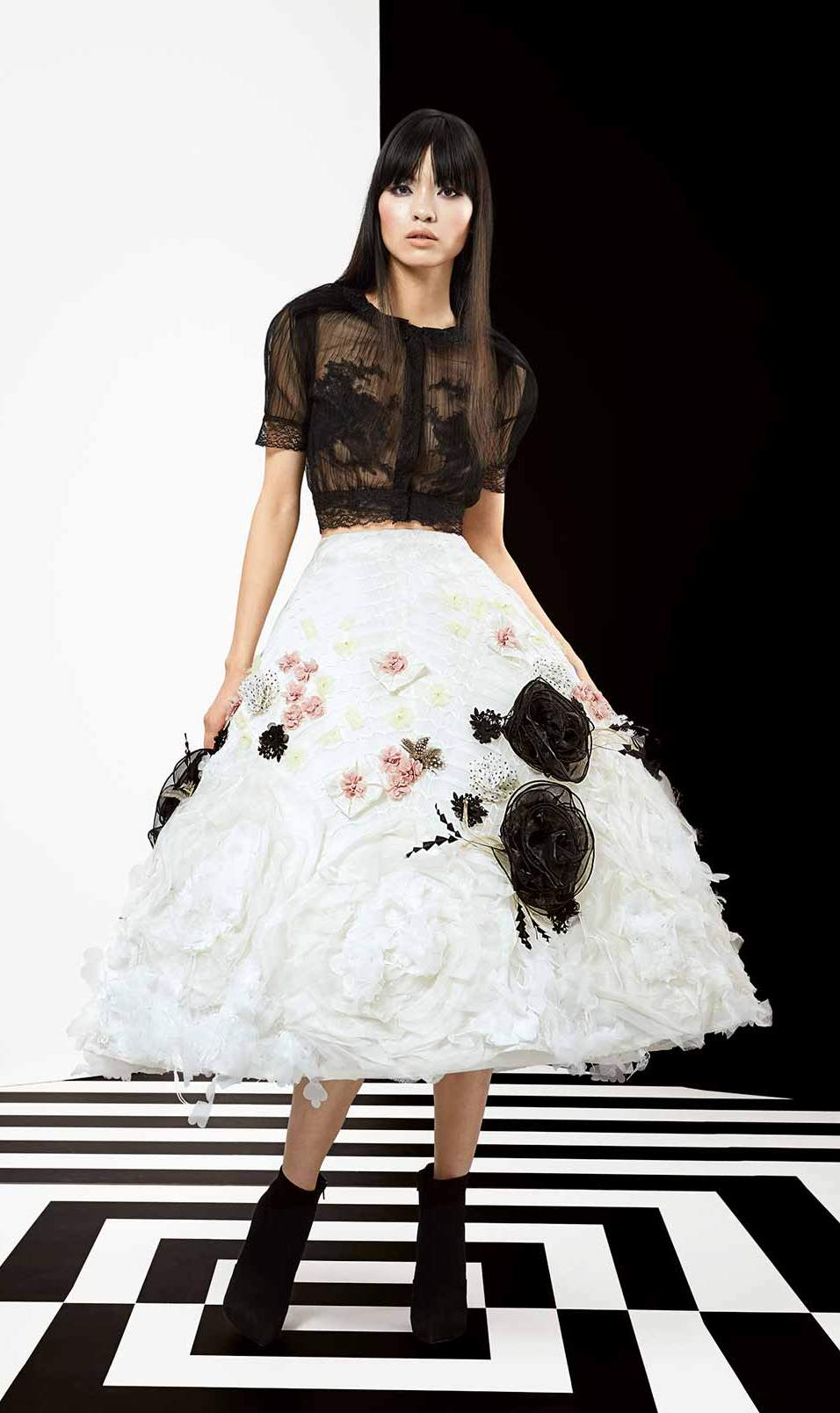 2 piece couture ensemble. Short slighly puffy sleeves black blouse and maxi white skirt with handmade pastel pink, silver and black floral appliques sewn by hand