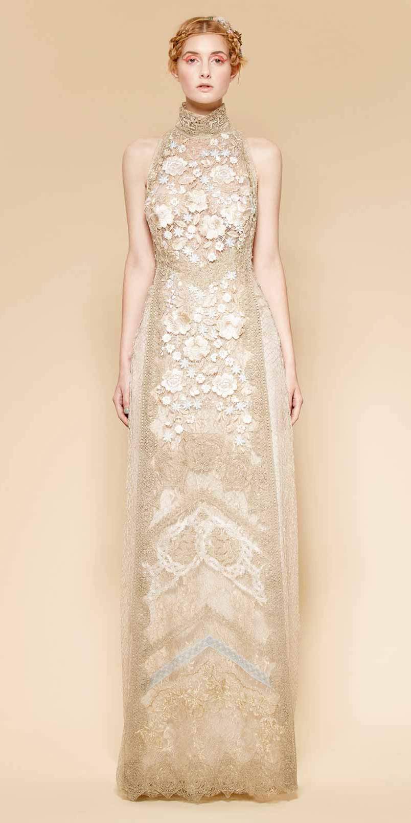 Long evening dress made of nude and gold laces. High neck and open back