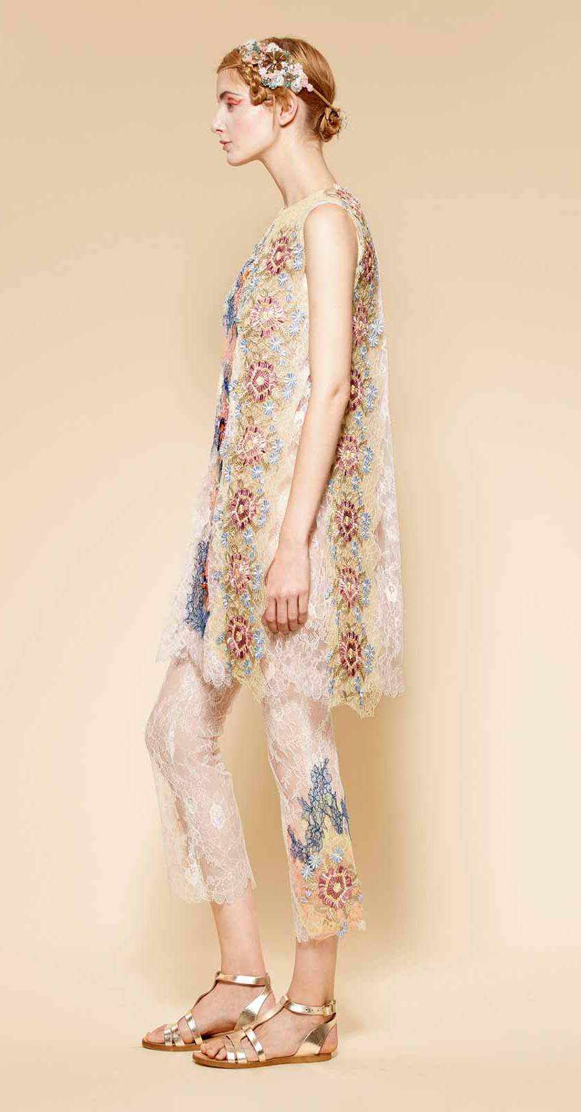 Sleeveless long lace blouse and matching cropped lace pants with original design in different soft colors and shades